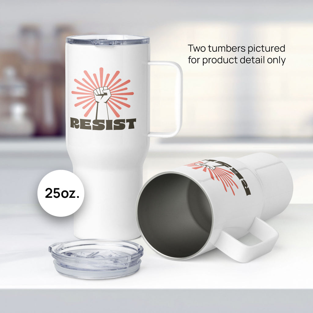 Pair of 25 ounce white stainless steel tumblers with handles, with graphic text "resist" below a raised fist and coral color burst, showing product detail.