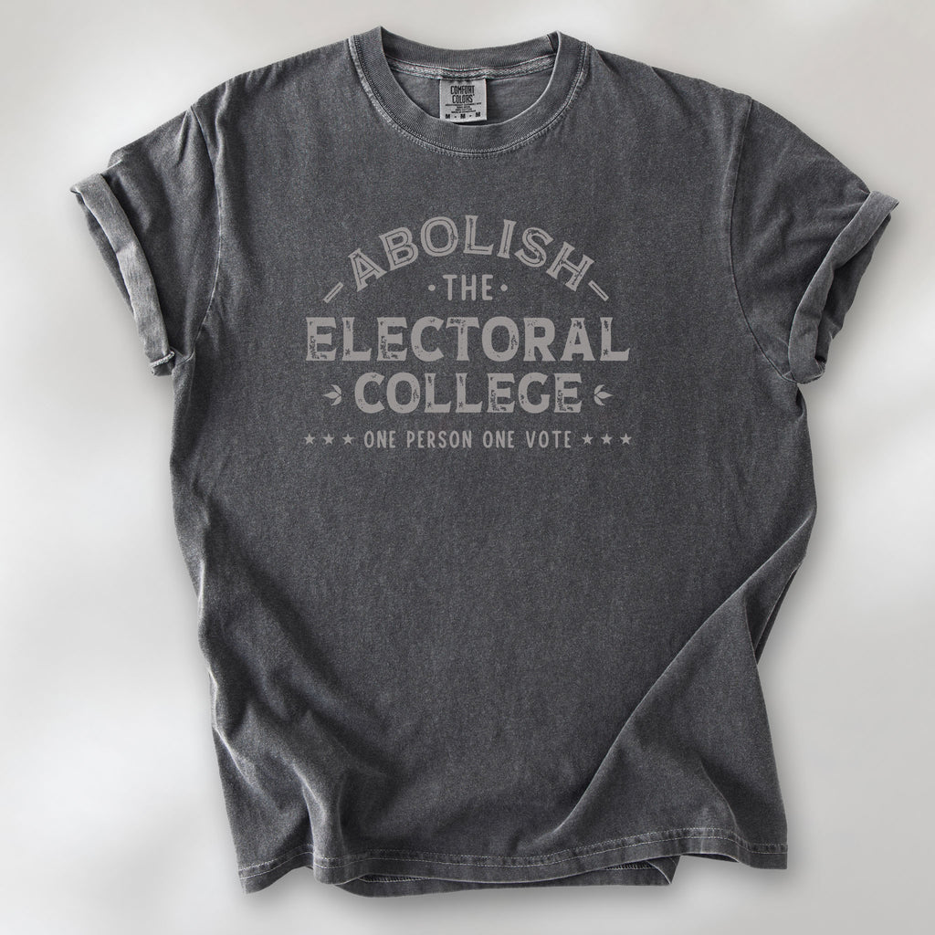 Pepper t-shirt with distressed text reading “Abolish the Electoral College One Person One Vote” in vintage style design