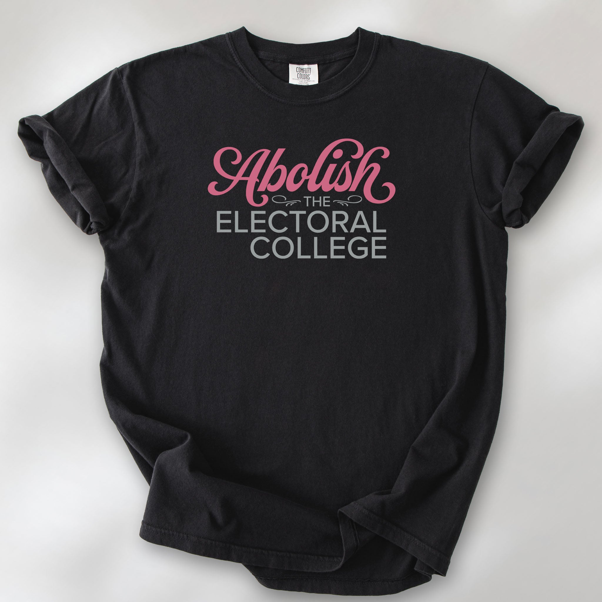 Black t-shirt with stylized text reading “Abolish the Electoral College” in muted red and gray.