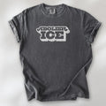 Pepper t-shirt with retro distressed text reading “Abolish ICE” for immigration justice and anti-ICE activism.