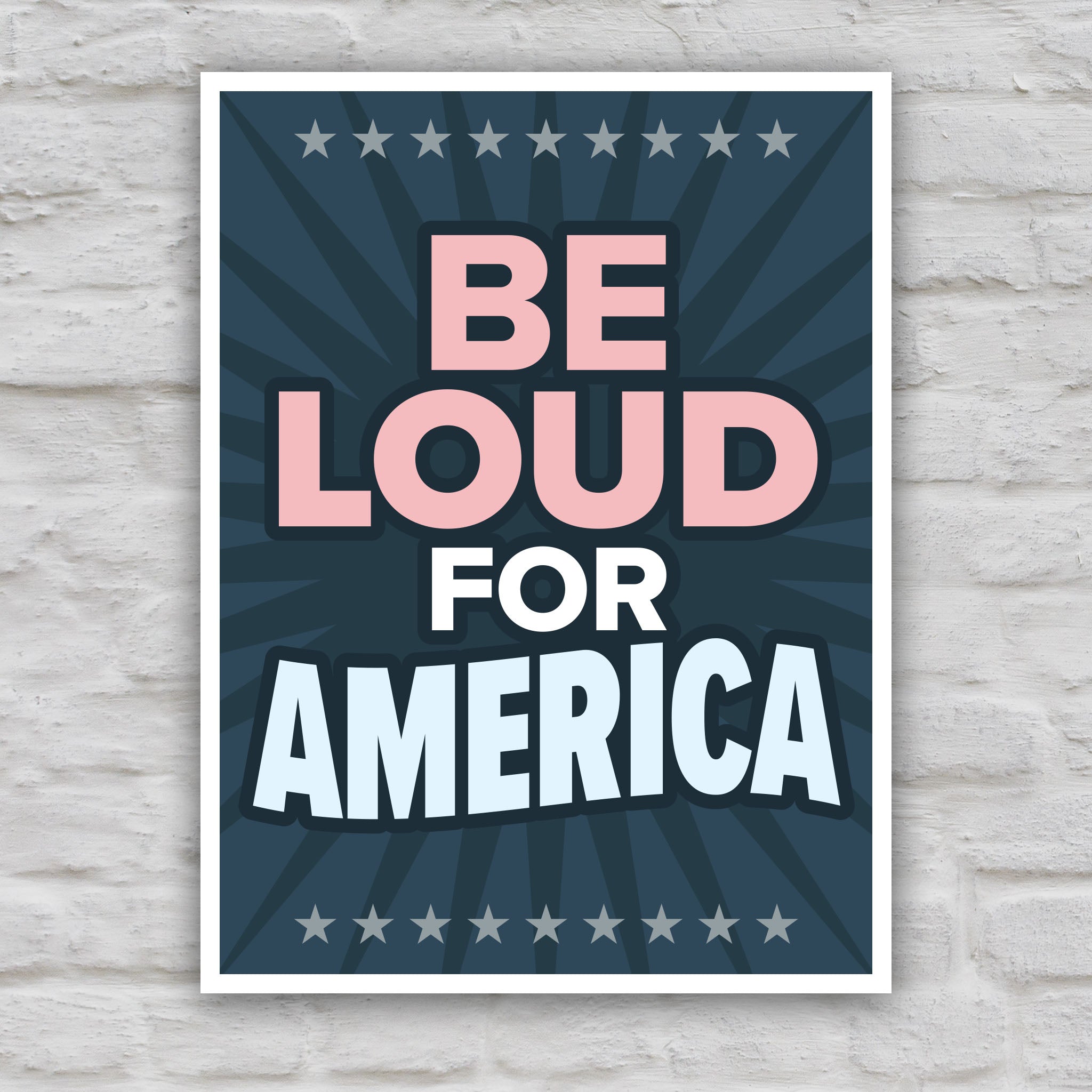Color version of protest sign with text “Be Loud for America” in patriotic colors.