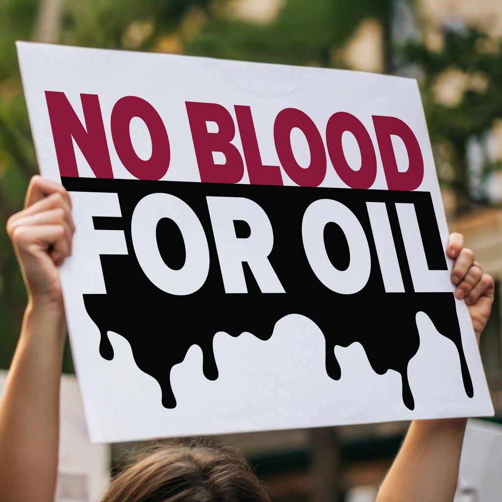 Person holding high a “No Blood for Oil" protest sign with bold text on background featuring dripping oil imagery, anti-war and anti-imperialism message.