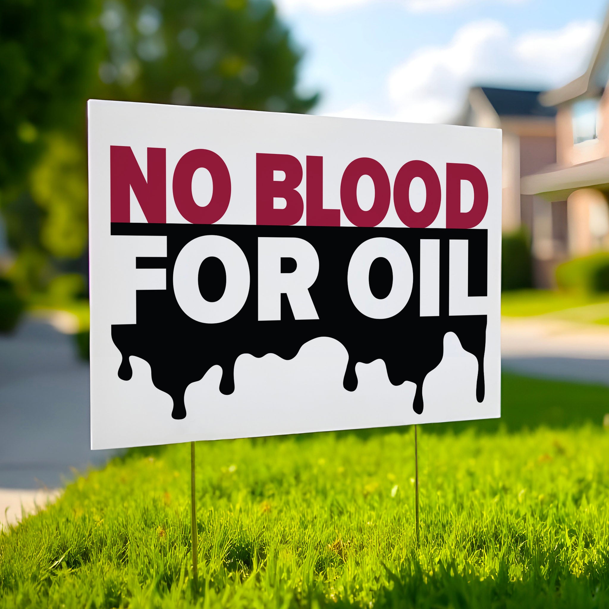 “No Blood for Oil" yard sign with bold text on background featuring dripping oil imagery, anti-war and anti-imperialism message.