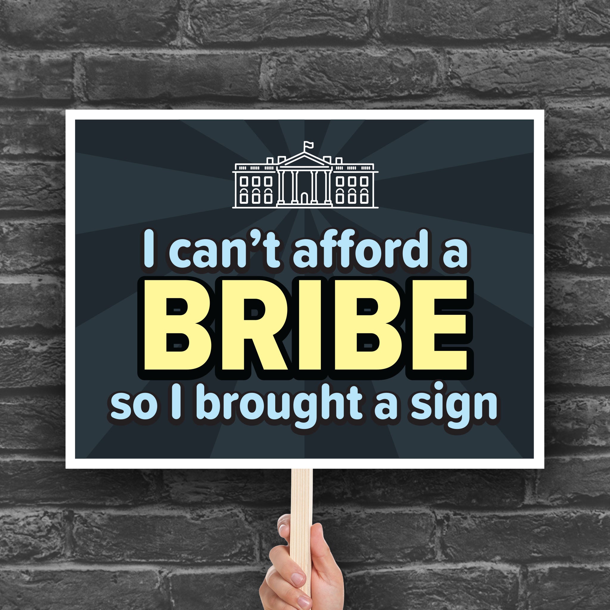 Downloadable, printable protest sign with a dark blue background and blue and yellow text that reads "I can't afford a bribe so I brought a sign" with an illustration of the White House, a condemnation of Trump's corruption.