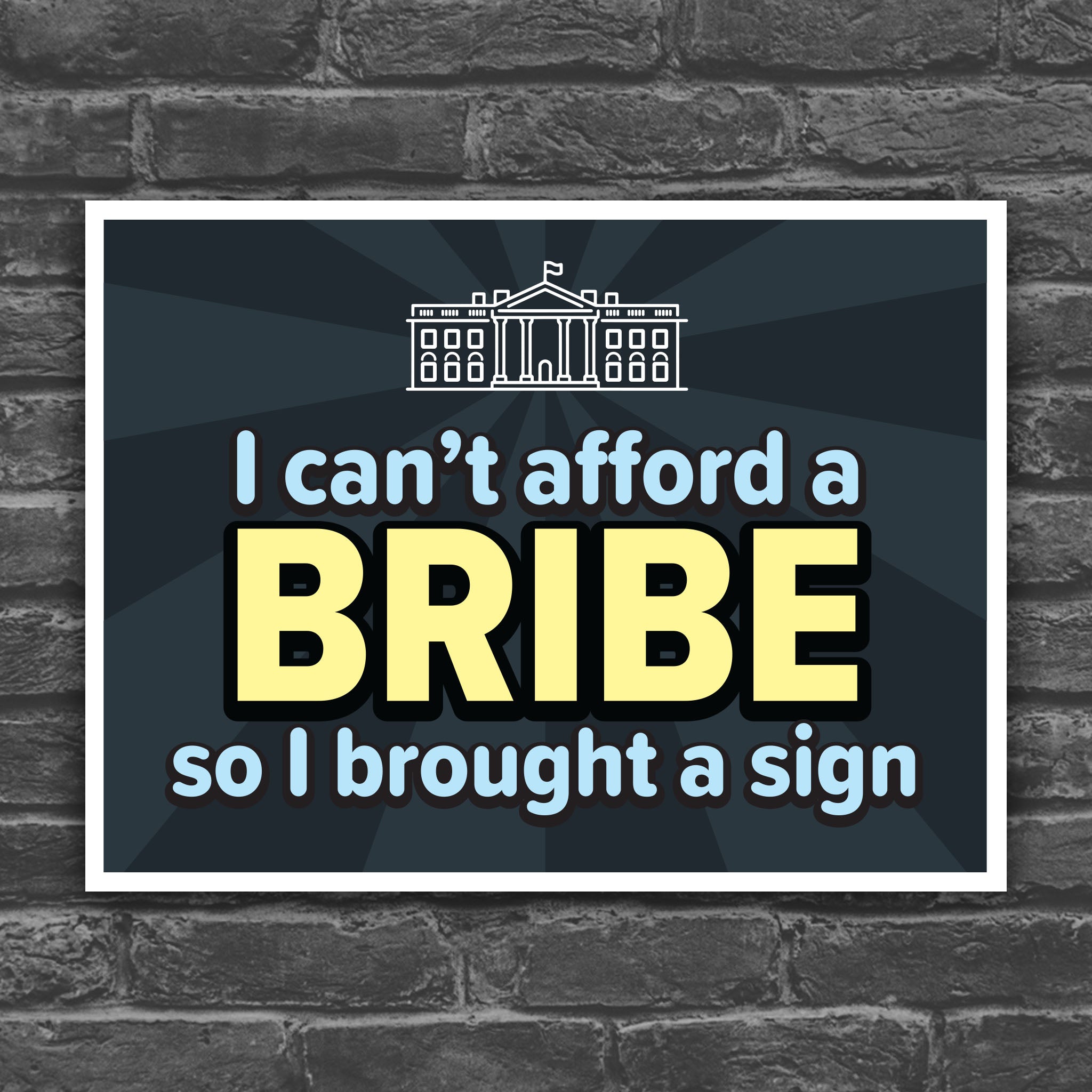 Color version of protest sign with a dark blue background and blue and yellow text that reads "I can't afford a bribe so I brought a sign" with an illustration of the White House, a condemnation of Trump's corruption.