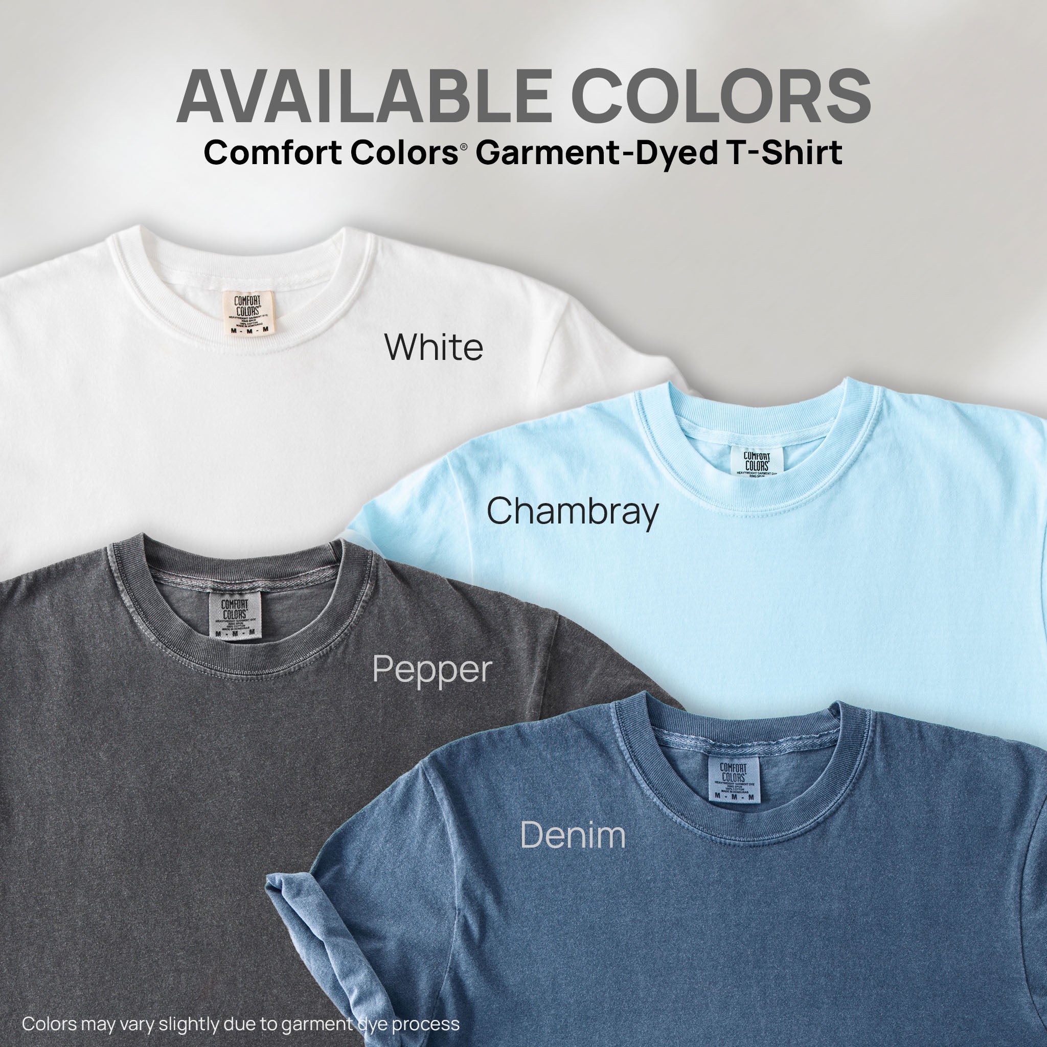 Four shirts showing the available colors for this Comfort Colors Garment-Dyed T-Shirt: white, chambray, pepper, denim.
