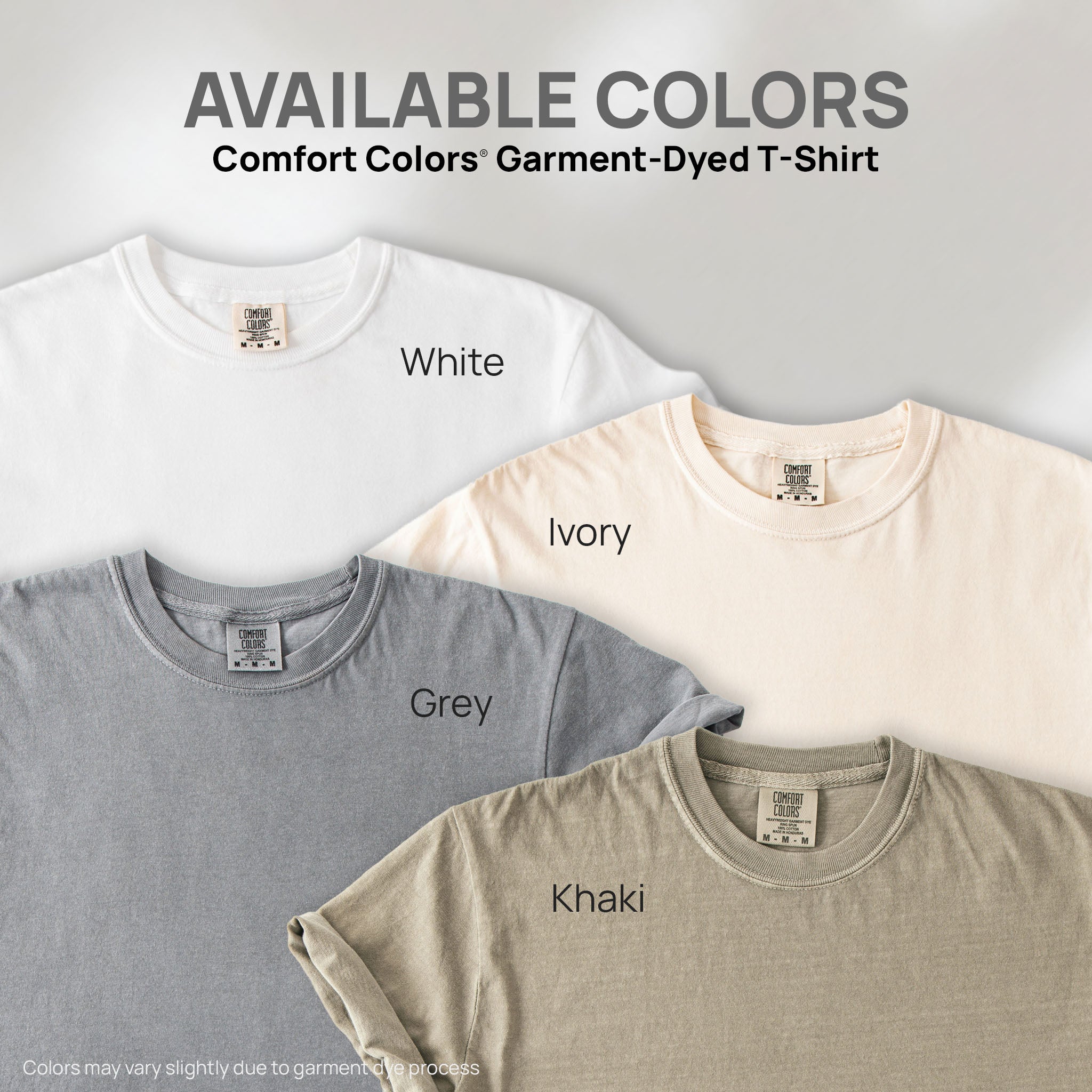 Four shirts showing the available colors for this Comfort Colors Garment-Dyed T-Shirt: white, ivory, grey, and khaki.

