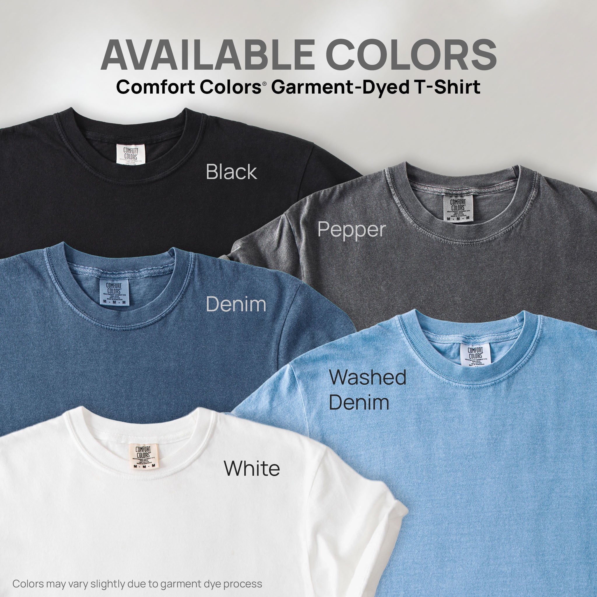 Five shirts showing the available colors for this Comfort Colors Garment-Dyed T-Shirt: black, pepper, denim, washed denim and white.
