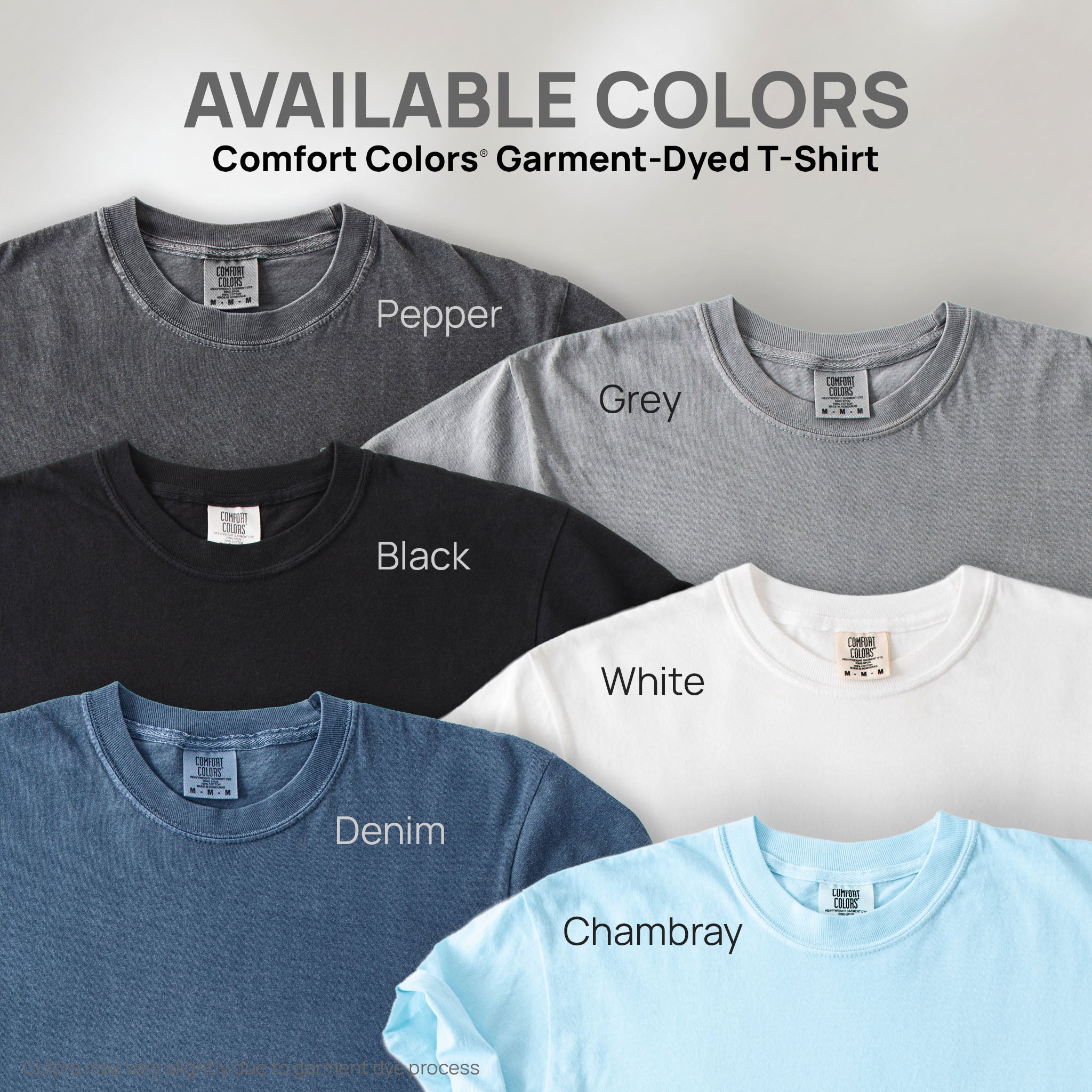 Six shirts showing the available colors for this Comfort Colors Garment-Dyed T-Shirt: pepper, grey, black, white, denim, and chambray.