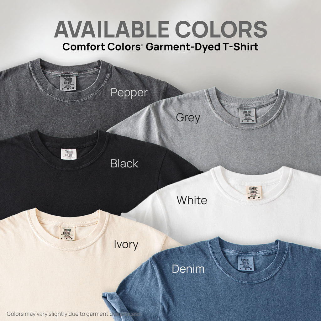 Six shirts showing the available colors for this Comfort Colors Garment-Dyed T-Shirt: pepper, grey, black, white, ivory, and denim.
