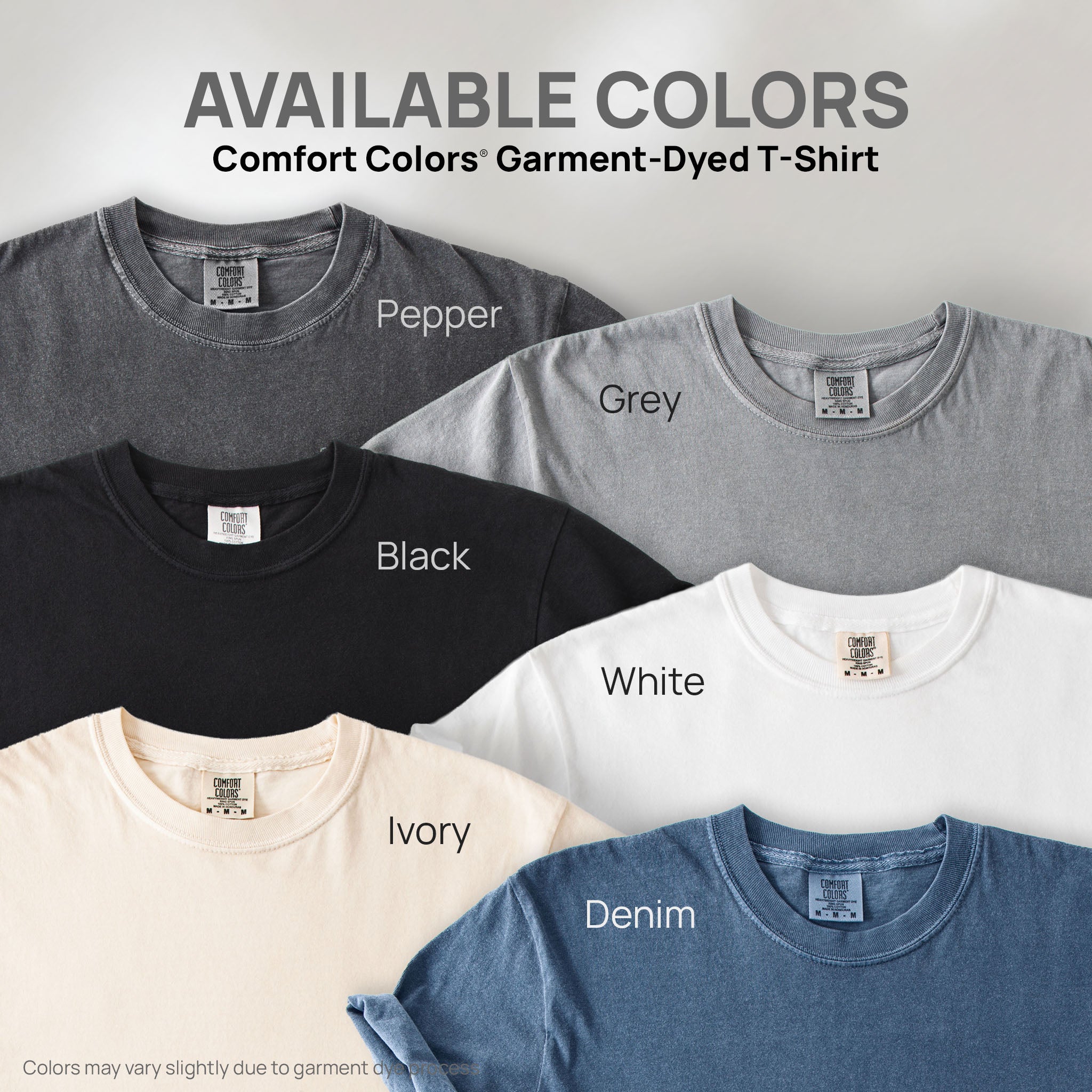 Six shirts showing the available colors for this Comfort Colors Garment-Dyed T-Shirt: pepper, grey, black, white, ivory, and denim.
