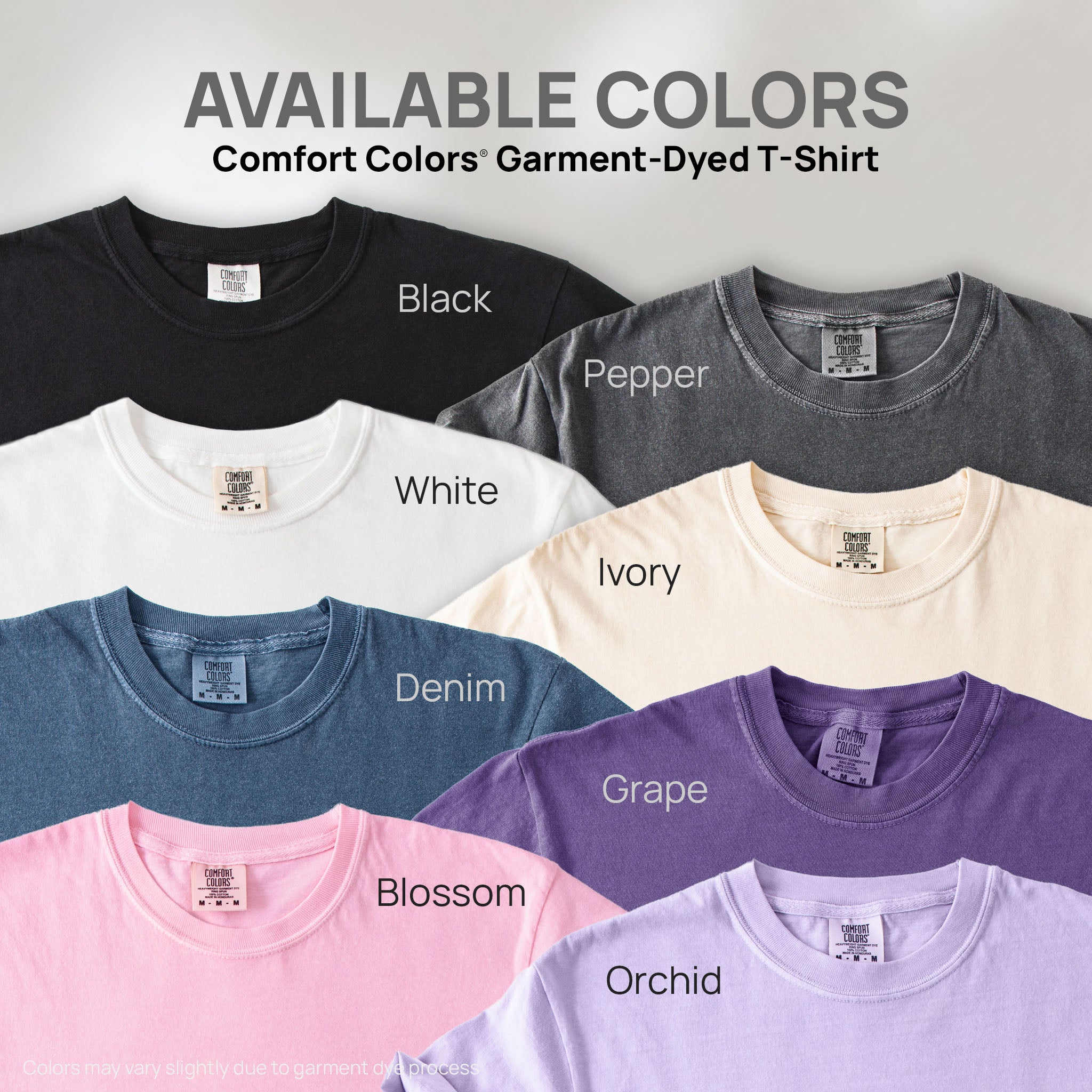 Eight shirts showing the available colors for this Comfort Colors Garment-Dyed T-Shirt: black, pepper, white, ivory, denim, grape, blossom, orchid.
