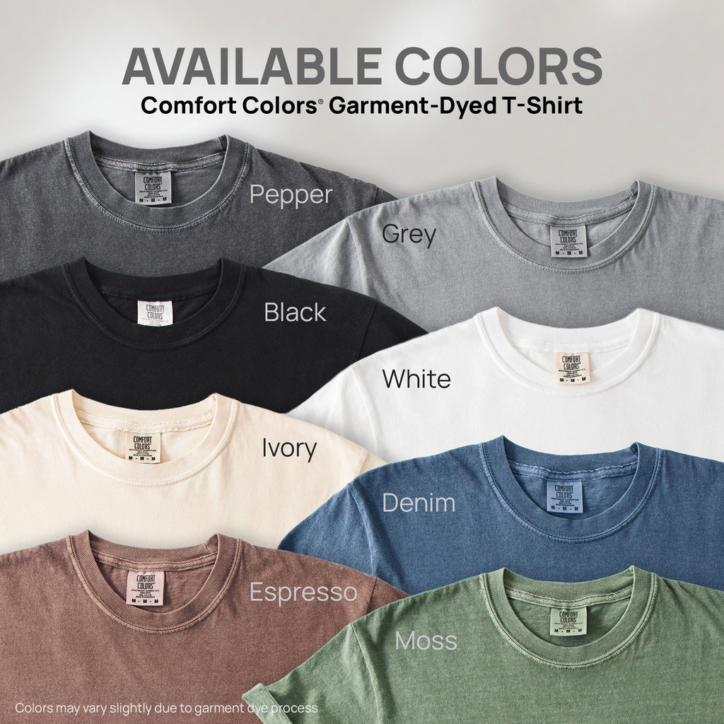 Eight shirts showing the available colors for this Comfort Colors Garment-Dyed T-Shirt: pepper, grey, black, white, ivory, denim, espresso, moss.
