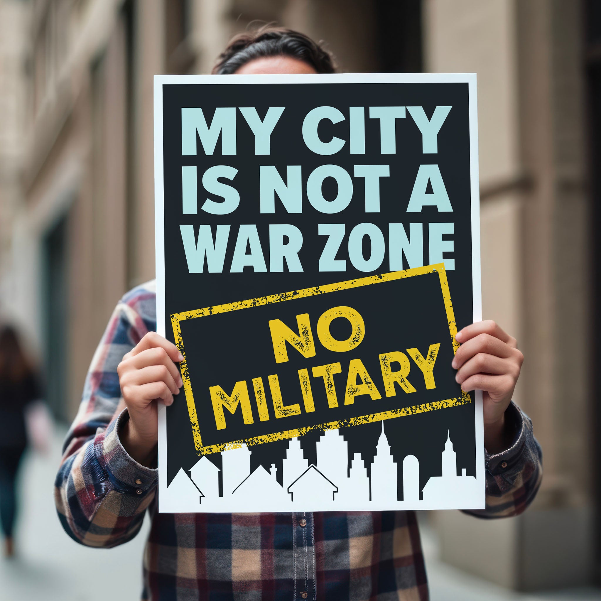 Person holding protest sign that reads "My City Is Not a War Zone – No Military" with bold lettering and a city skyline silhouette.