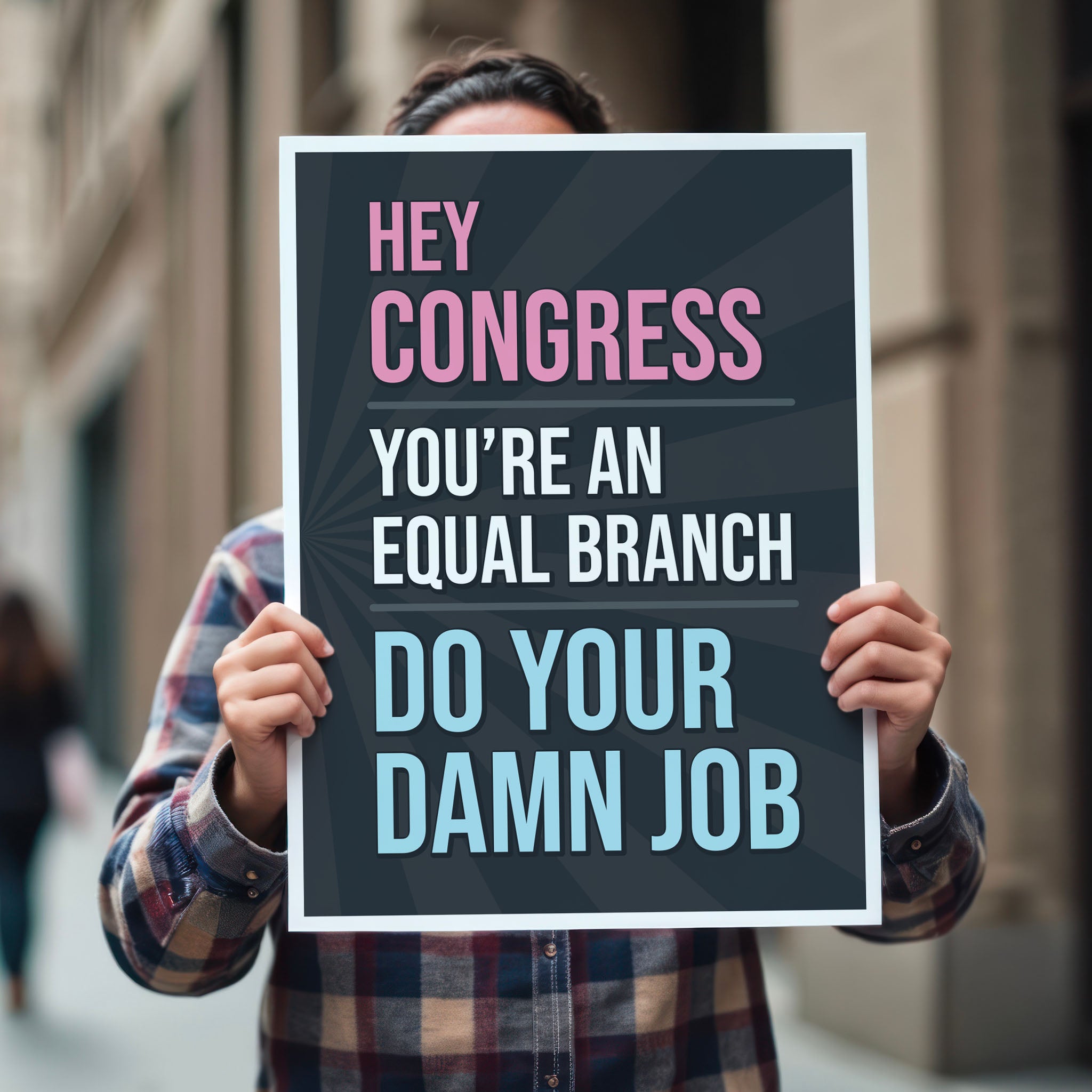 Person holding protest sign with bold text that says “Hey Congress, you’re an equal branch, do your damn job” calling out Congress for not standing up to Trump’s abuses of power.
