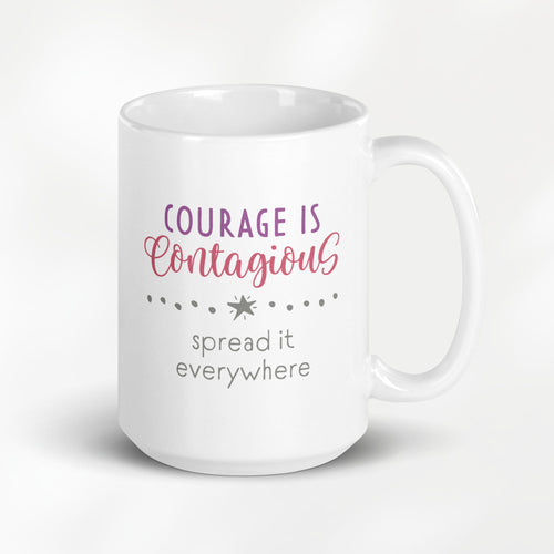 15 ounce white ceramic mug with styled text graphic that reads "courage is contagious – spread it everywhere".