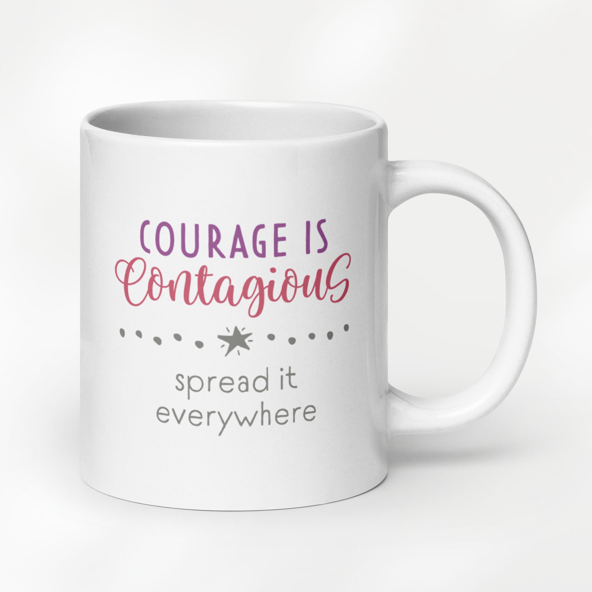 20 ounce white ceramic mug with styled text graphic that reads "courage is contagious – spread it everywhere".