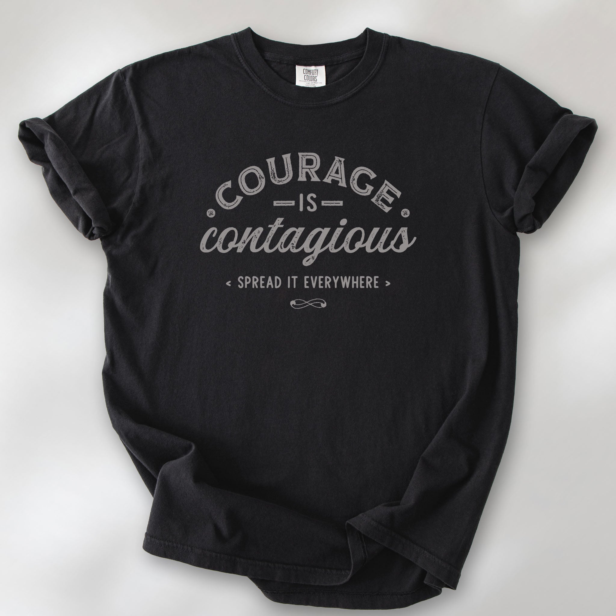Black "Courage Is Contagious Spread It Everywhere" t-shirt. 