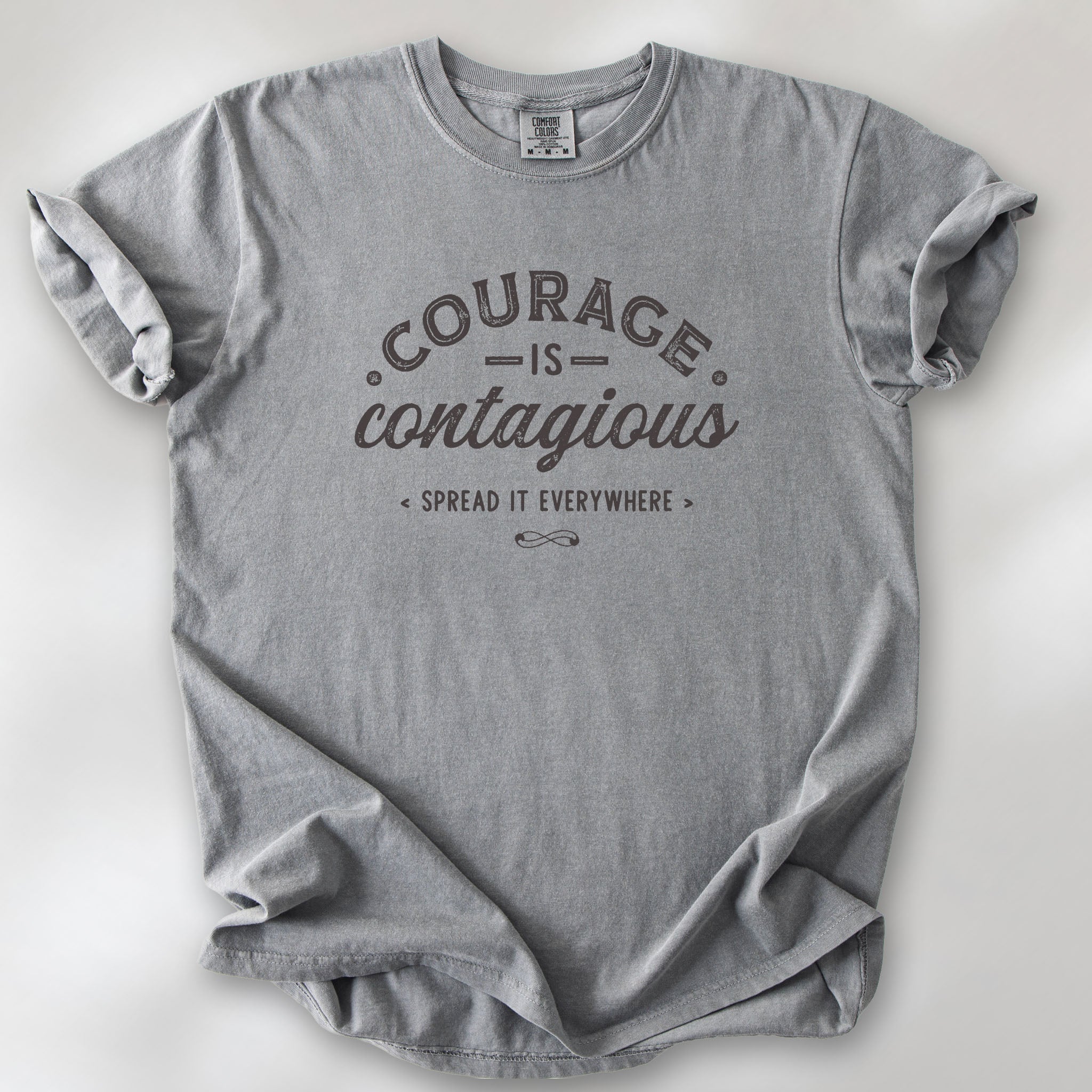Grey "Courage Is Contagious Spread It Everywhere" t-shirt. 