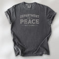 Pepper t-shirt with distressed text reading “Department of Peace — Unity is Power” in vintage style design.