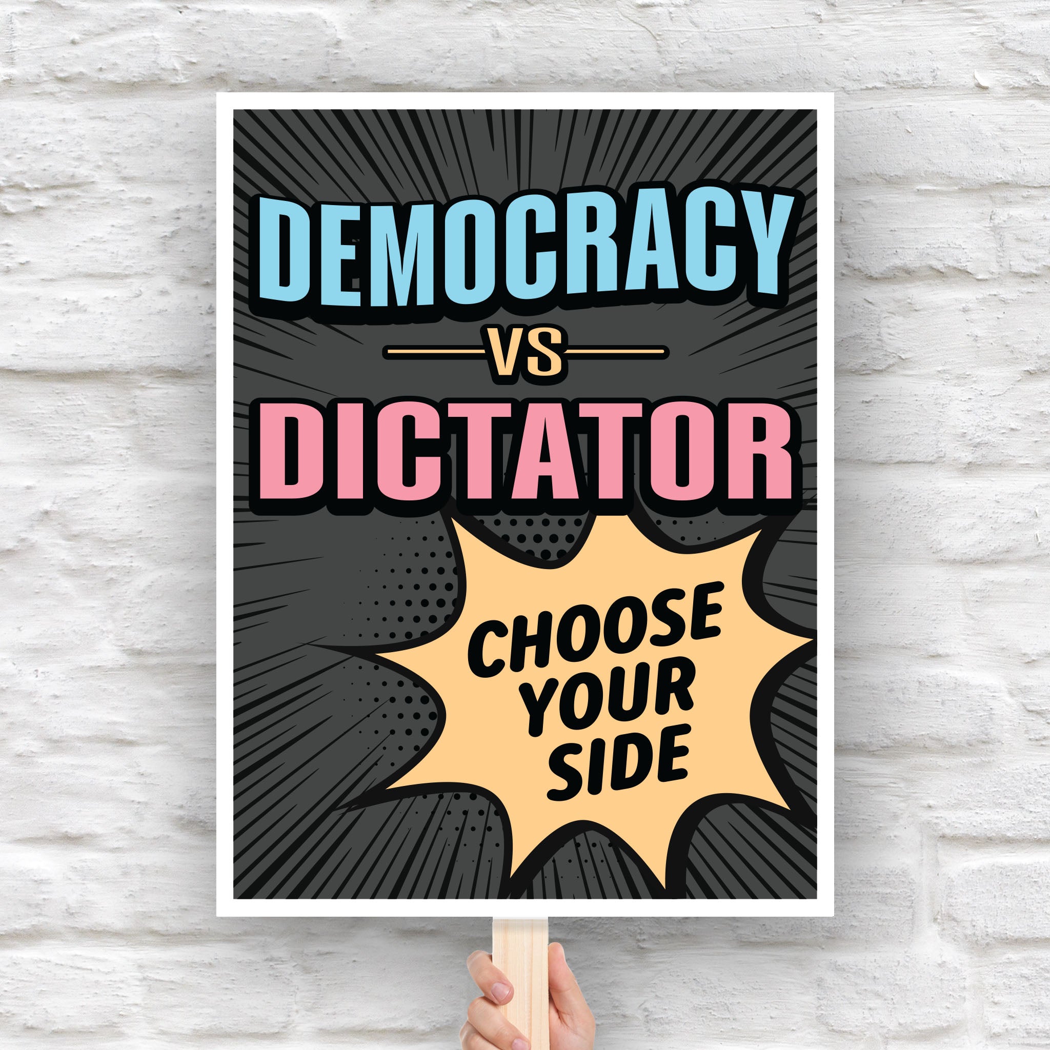 Downloadable, printable protest sign reading “Democracy vs Dictator – Choose Your Side” in bold comic-style lettering, a political protest poster against Trump.