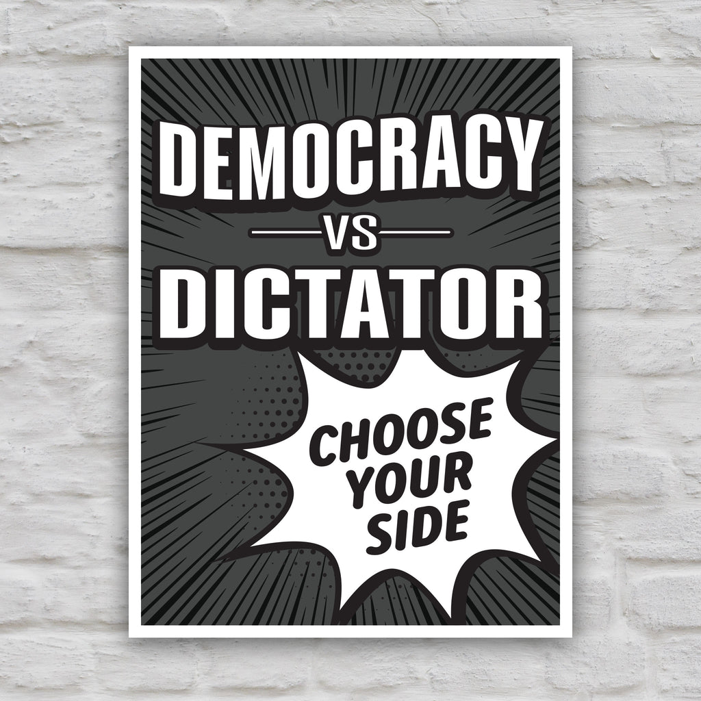 Black and white version of protest sign reading “Democracy vs Dictator – Choose Your Side” in bold comic-style lettering, a political protest poster against Trump.