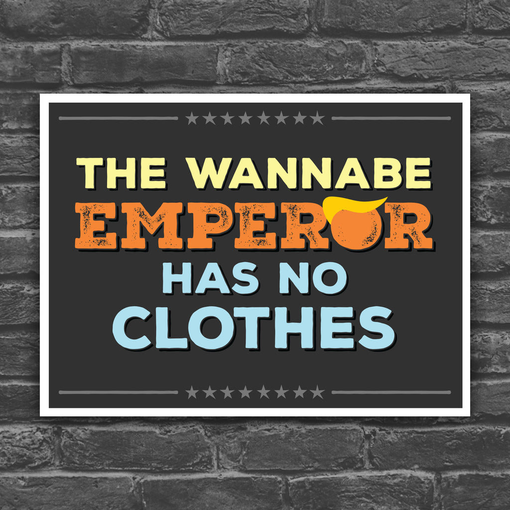Color version of protest sign reading “The Wannabe Emperor Has No Clothes” with bold lettering and a stylized yellow hair graphic.