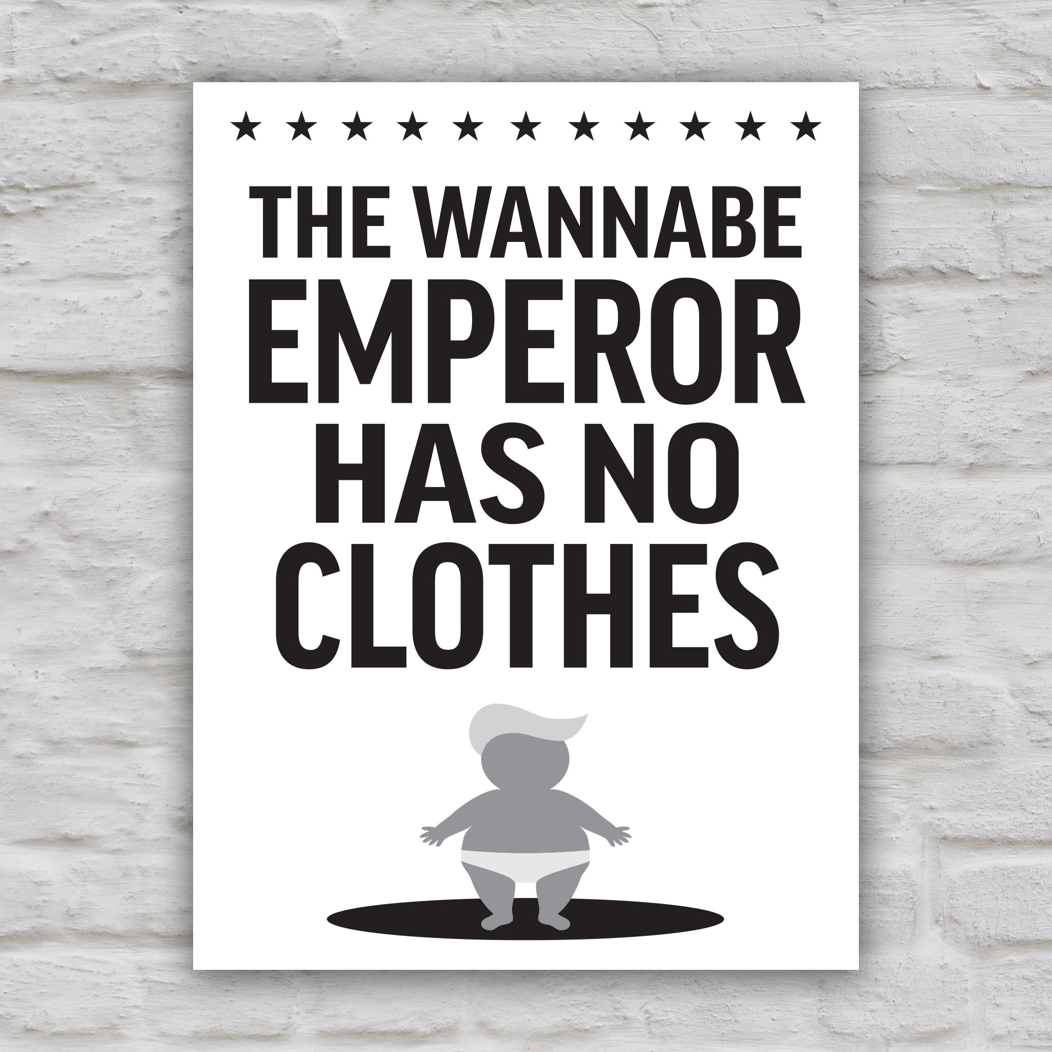 Black and white version of protest sign reading “The Wannabe Emperor Has No Clothes” with cartoon illustration of an orange baby with weird yellow hair dressed only in his underwear, looking much like Donald Trump.