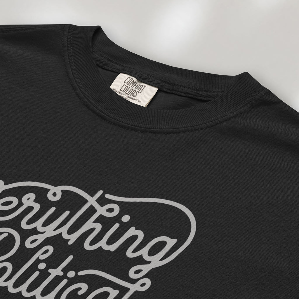 Closeup detail of black minimalist script everything is political activist shirt.