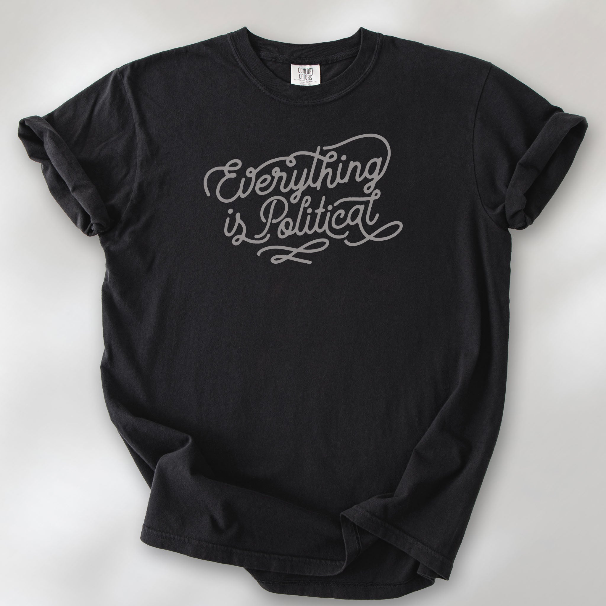 Black shirt with minimalist script "everything is political" graphic.