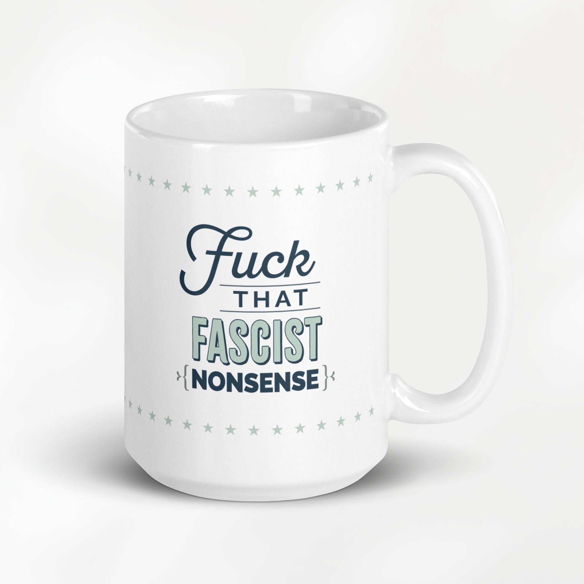 15 ounce ceramic mug with stylized graphic that reads "fuck that fascist nonsense".