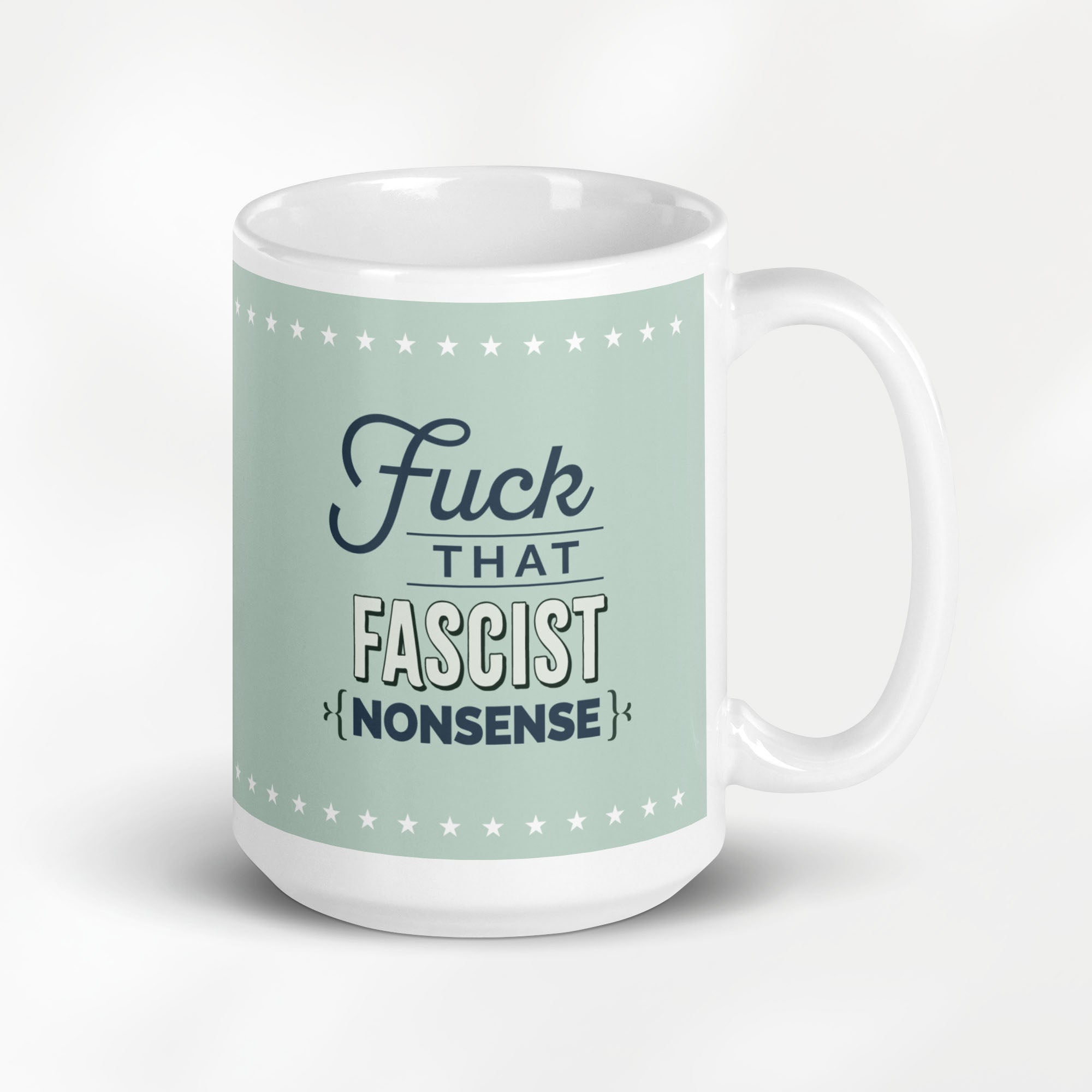 15 ounce ceramic mug with graphic on mint green background and navy styled text block that reads "fuck that fascist nonsense." 