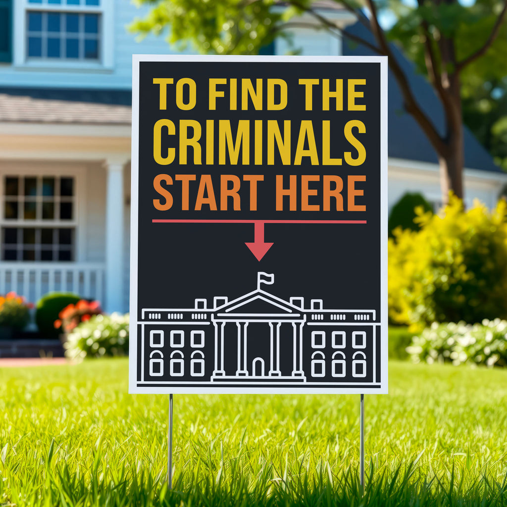 Yard sign with bold text reading "To Find the Criminals Start Here" and an arrow pointing at the White House illustration, planted in a green lawn.