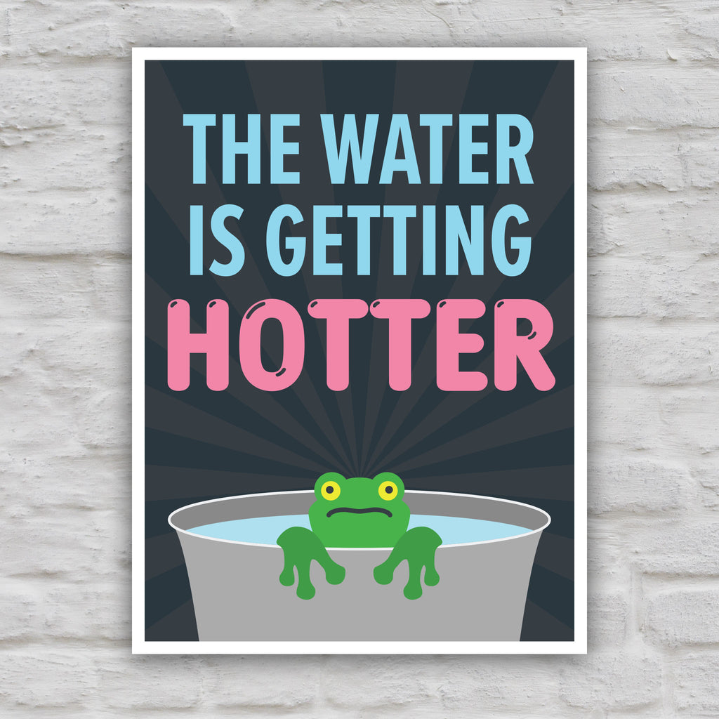Color version of anti-trump protest sign with bold text that says "The water is getting hotter" above a cartoon illustration of a panicked frog in a pot of water.