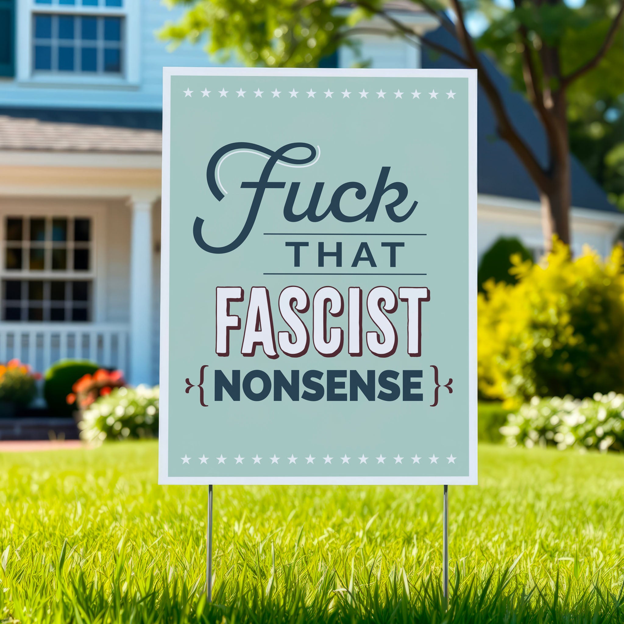 Yard sign with bold, stylized text that reads “Fuck That Fascist Nonsense.", planted in green lawn.