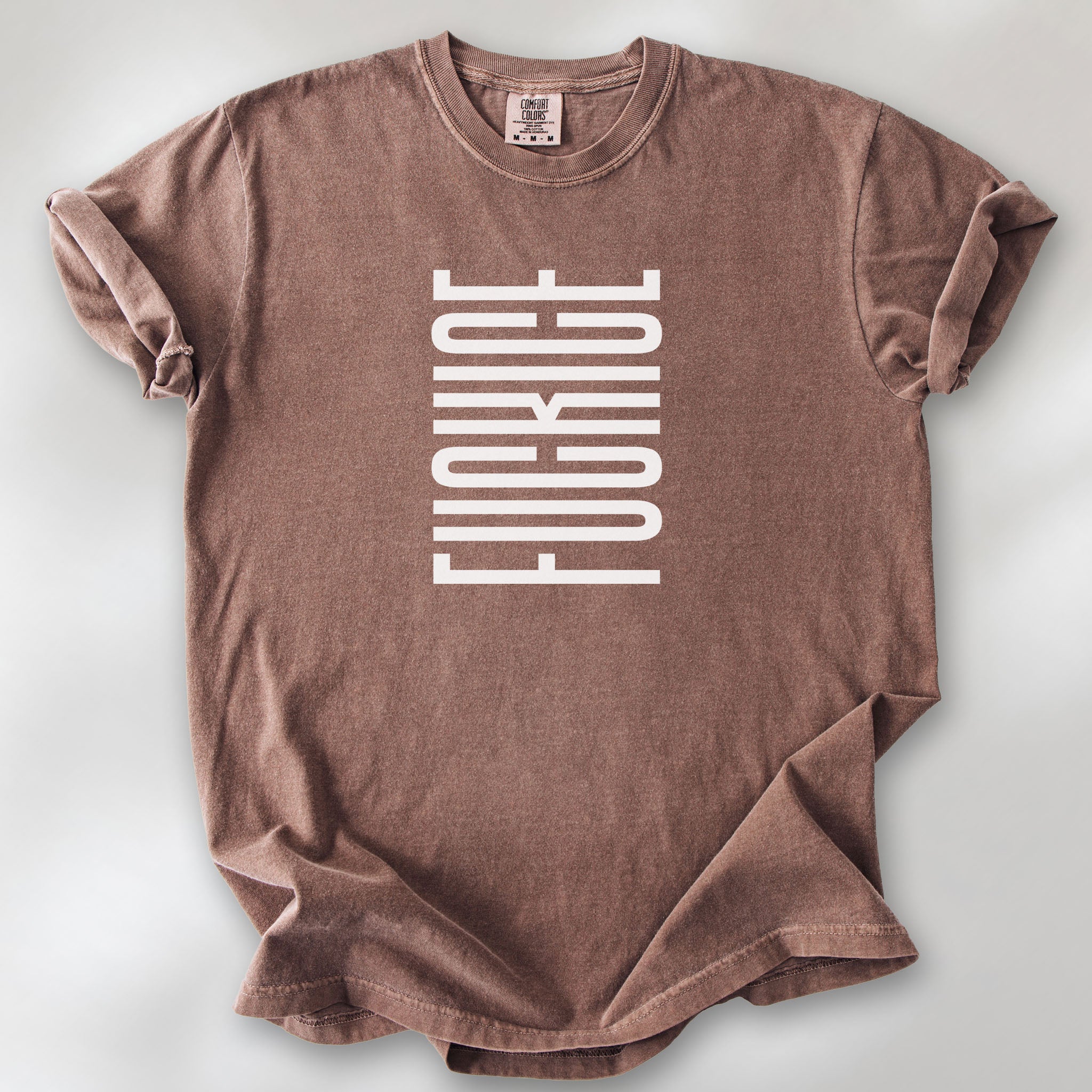 Espresso t-shirt with minimalist geometric design that subtly spells “Fuck ICE” using stacked bars and negative space, hidden protest message shirt.