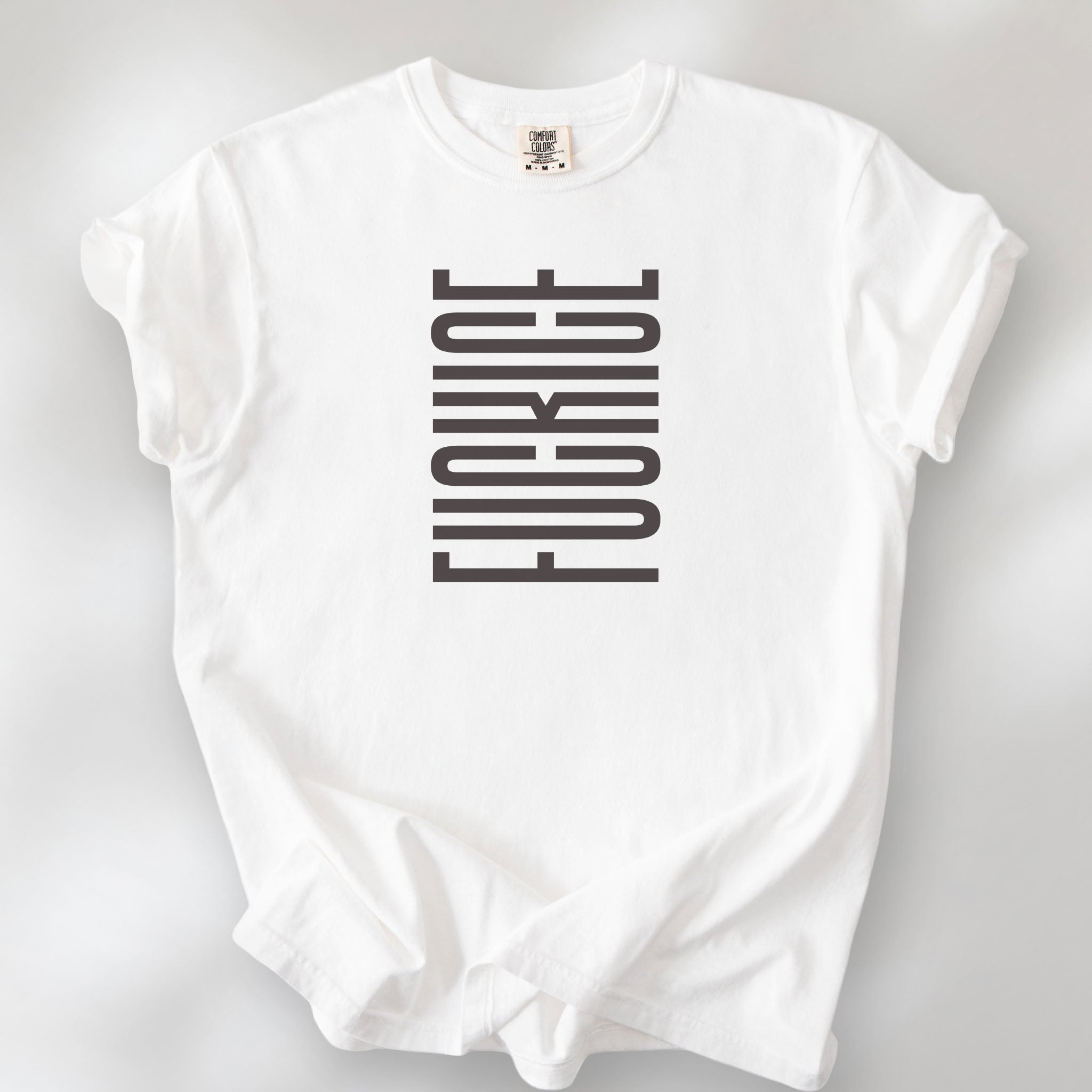 White t-shirt with minimalist geometric design that subtly spells “Fuck ICE” using stacked bars and negative space, hidden protest message shirt.