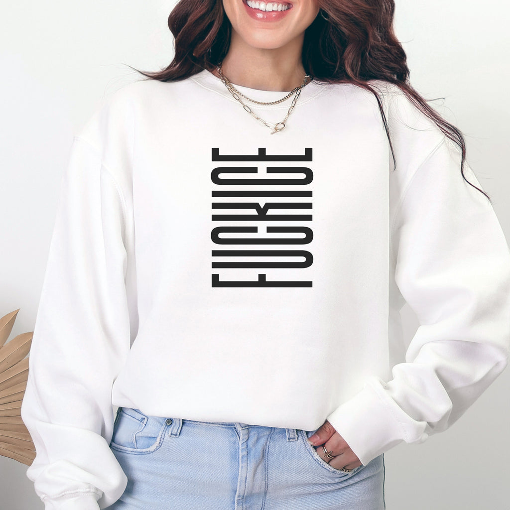 Female model wearing white sweatshirt with minimalist black geometric design that subtly spells “Fuck ICE” using stacked bars and negative space, hidden protest message shirt.