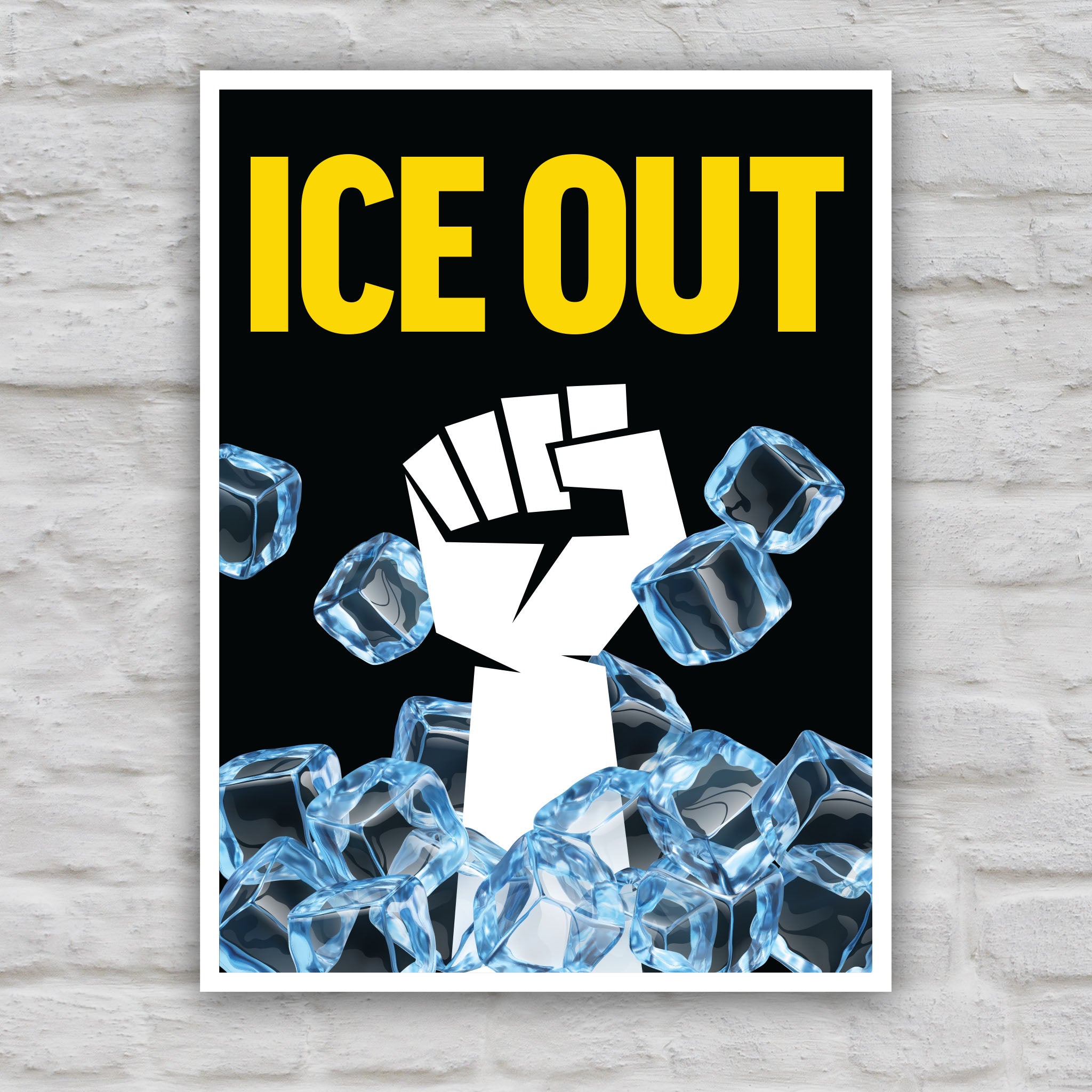 Color version of protest sign reading “ice out” in yellow text above a white raised fist breaking through blue ice cubes on a black background.