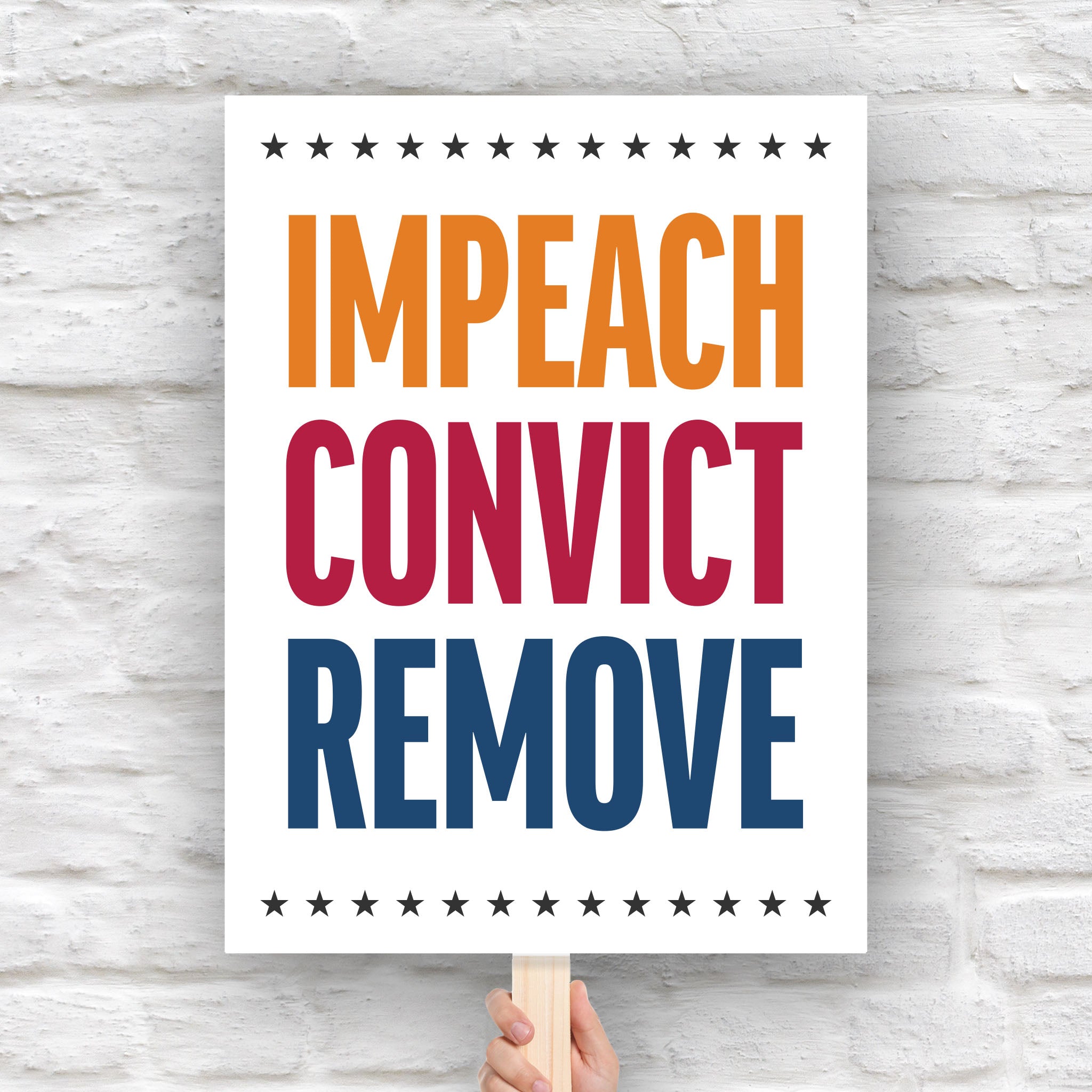 Anti-Trump protest sign reading “Impeach Convict Remove” in bold red, blue, and orange text with stars.