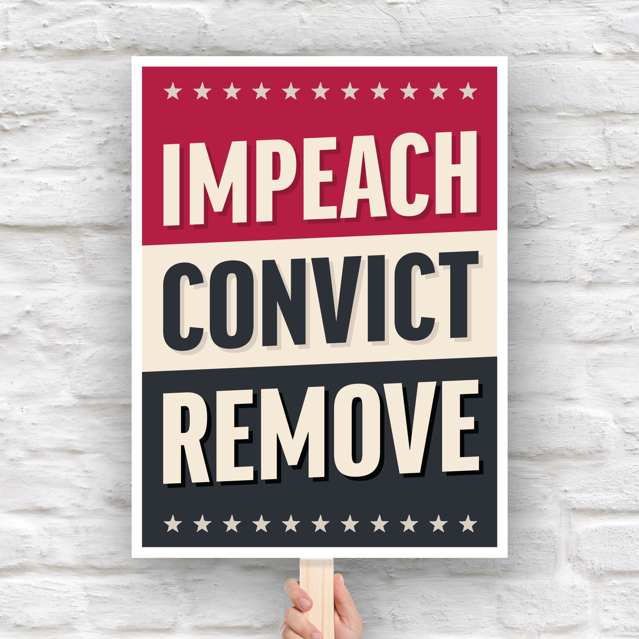 Protest sign reading “Impeach Convict Remove” in bold patriotic lettering.