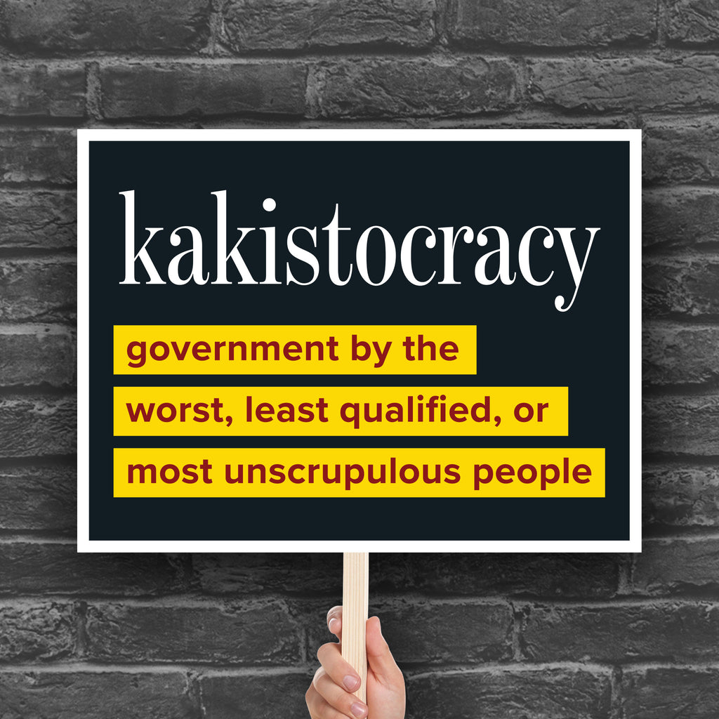 Protest sign with large bold text reading “Kakistocracy – government by the worst, least qualified, or most unscrupulous people,” political march sign, activist rally poster.