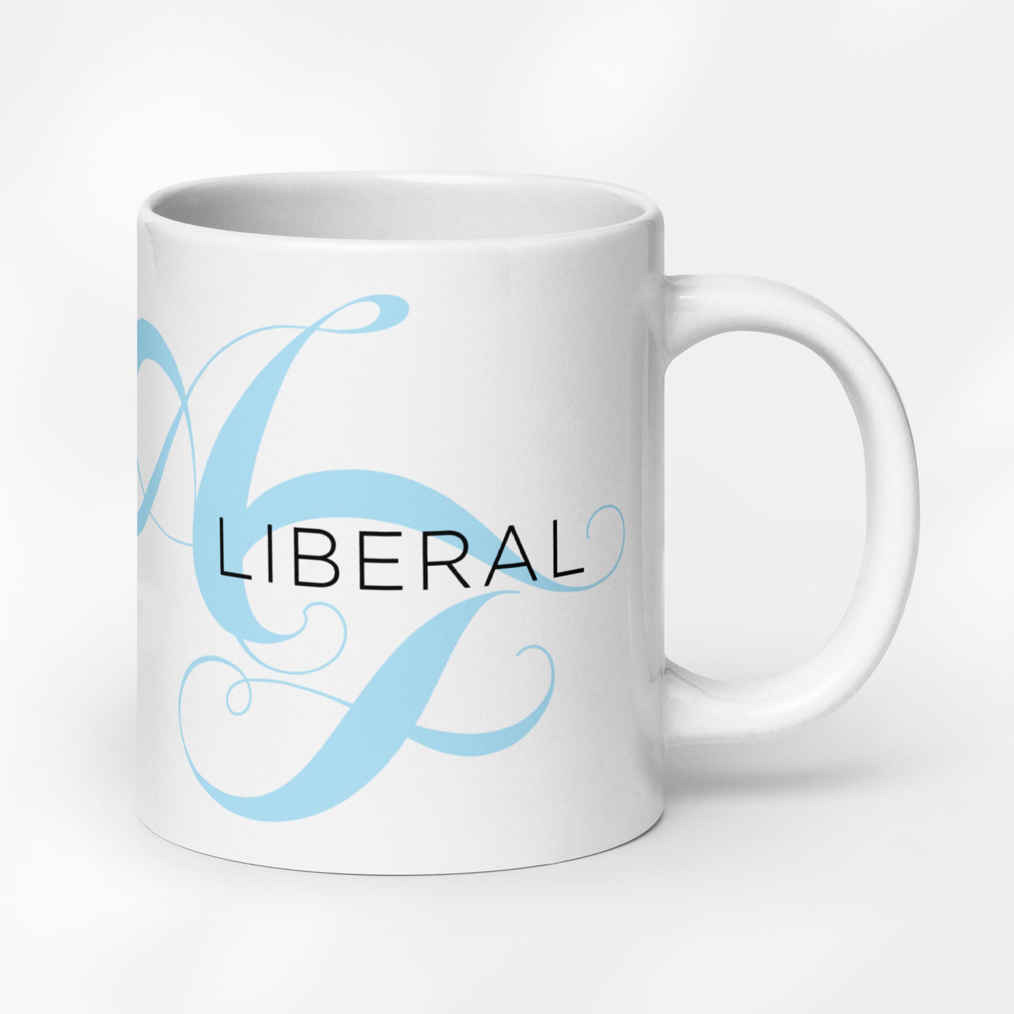 20 ounce white ceramic mug with the word “Liberal” in black text and a subtle light bright blue script design of the letters A and F in the background.
