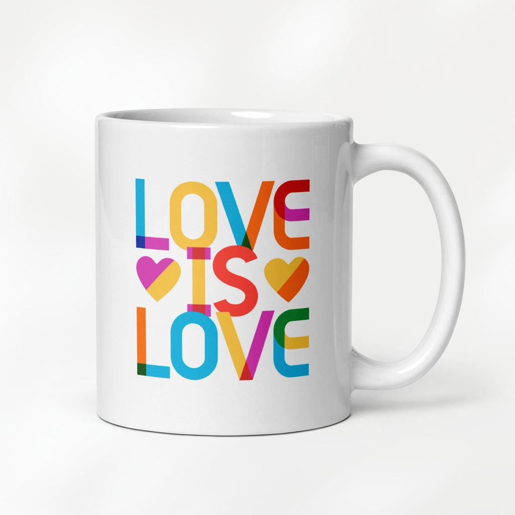 11 ounce white ceramic coffee mug with rainbow “love is love” text in a block design.