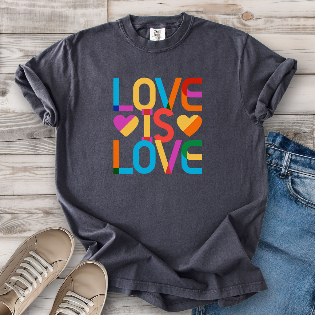Graphite grey t-shirt with rainbow “love is love” text designed in the Gilbert font.