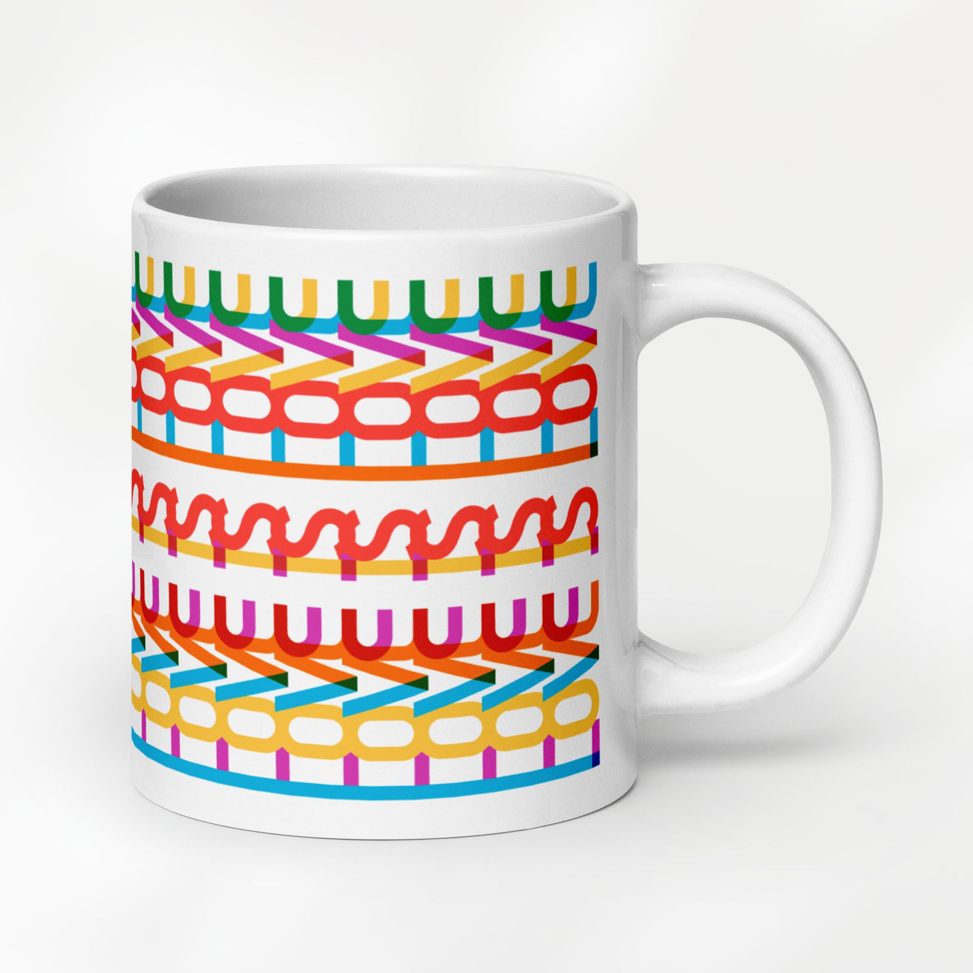 20 ournce coffee mug with a repeating hidden “love is love” message in the Gilbert font, featuring bright rainbow-inspired patterns wrapped around the mug.