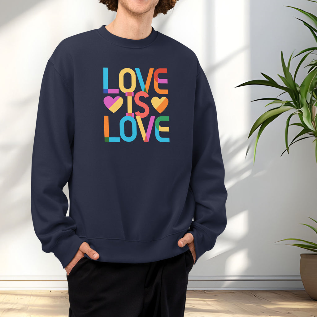 Male model wearing navy t-shirt with rainbow “love is love” text designed in the Gilbert font.