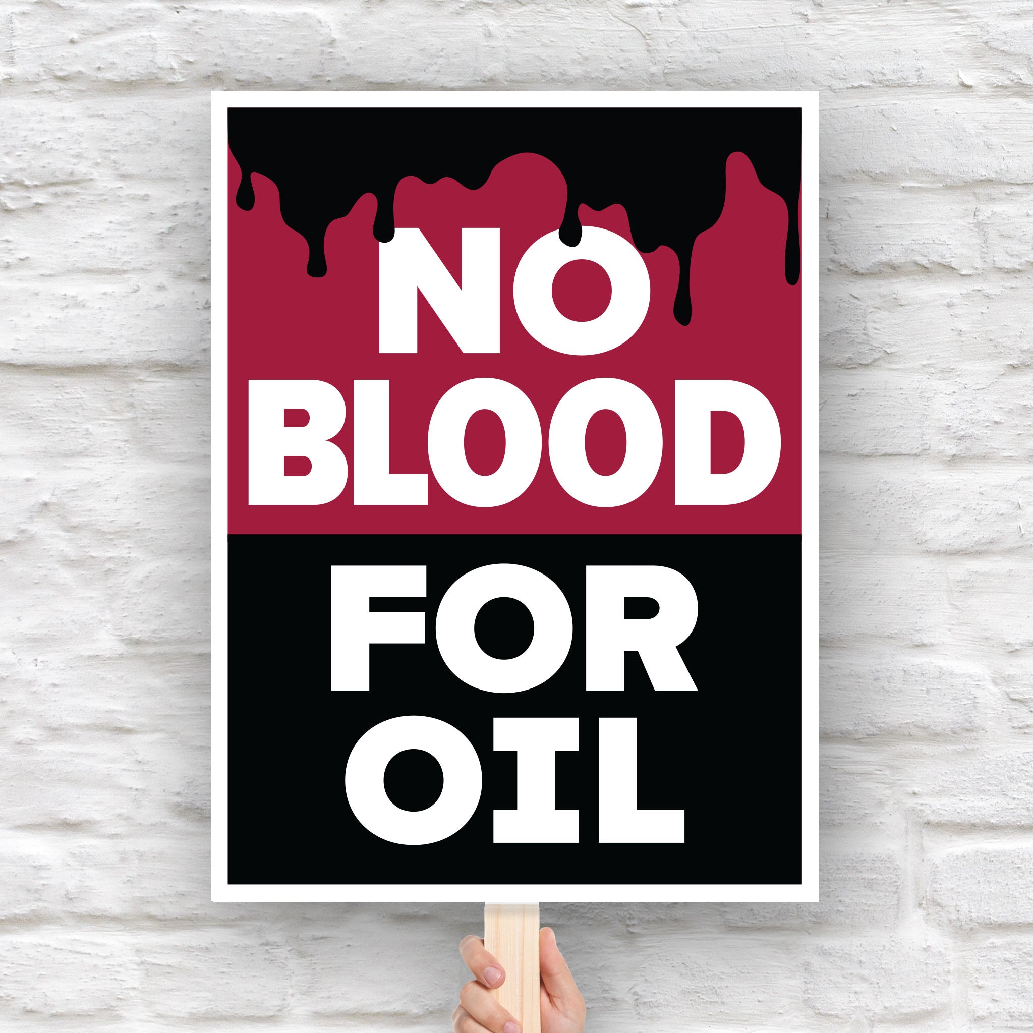 “No Blood for Oil" protest sign with bold white text on black and red background featuring dripping oil imagery, anti-war and anti-imperialism message.