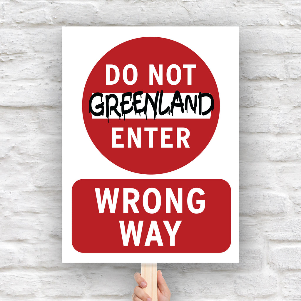 Protest sign reading “Do Not Enter Greenland” in bold text like a traffic sign, criticizing Trump’s foreign policy threats and U.S. imperialism.