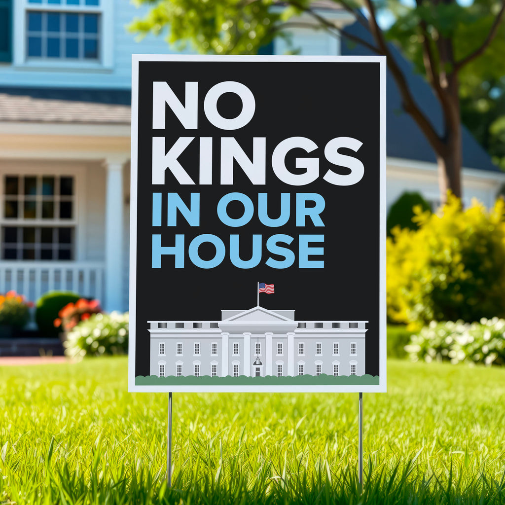 Yard sign reading “No Kings in Our House” with the White House illustration.